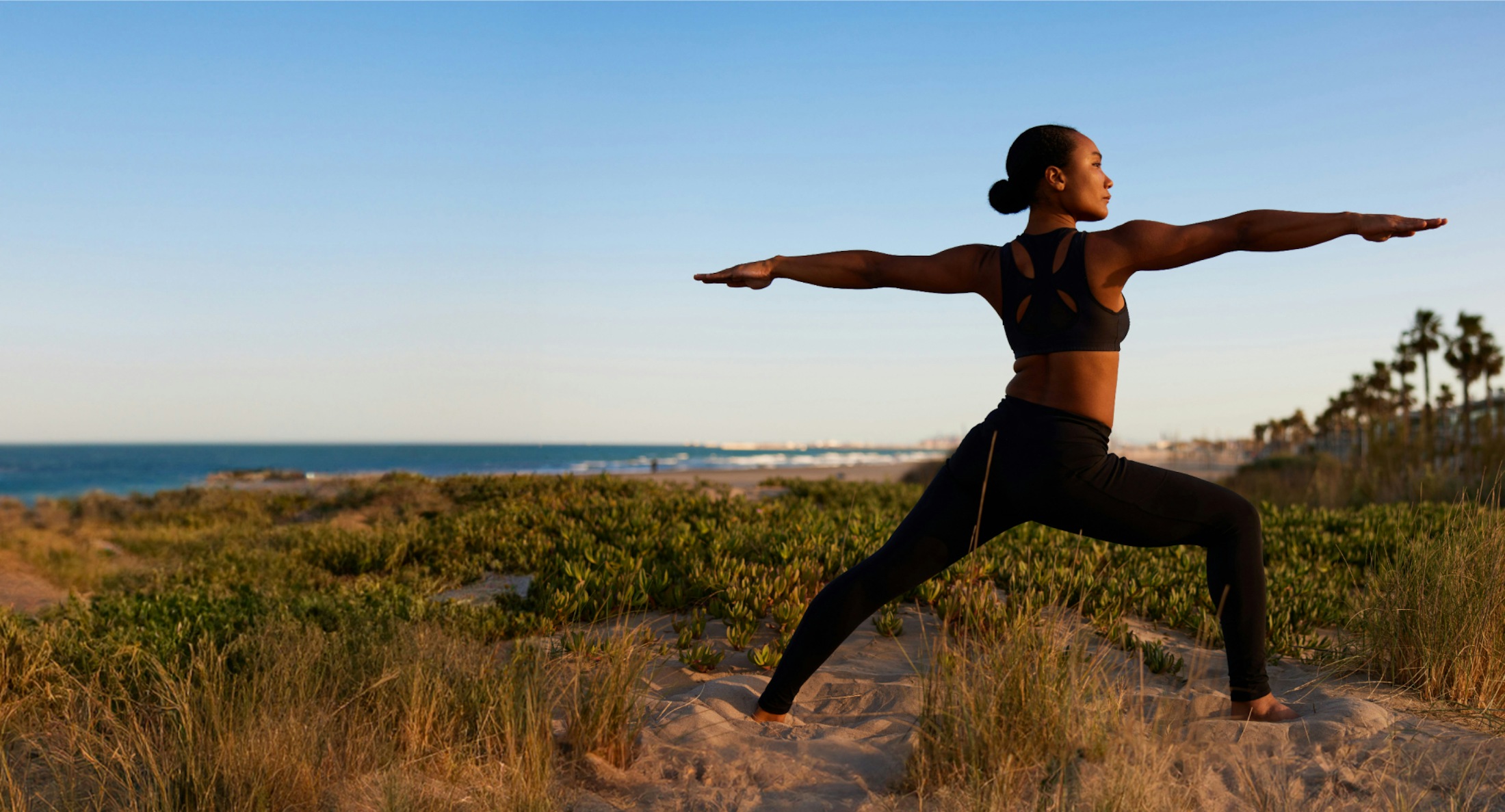 woman doing yoga outside