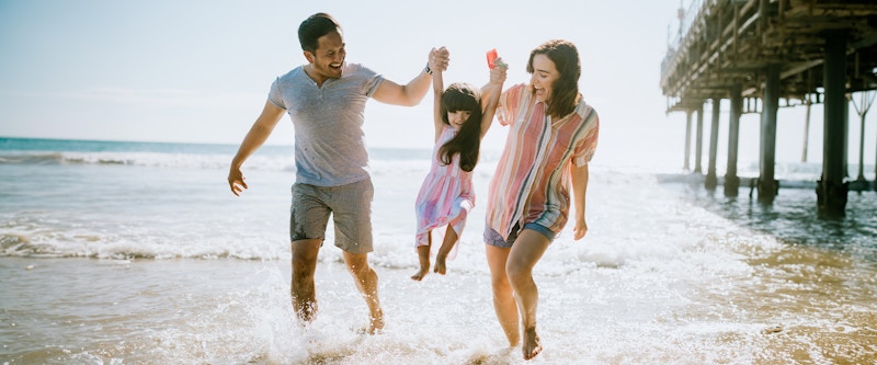 A family running out of the water