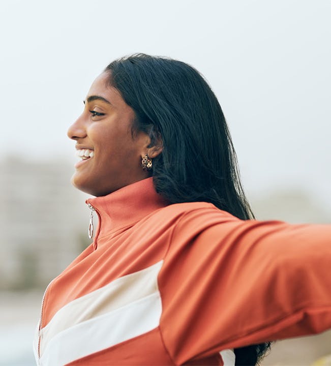 Woman smiling and stretching