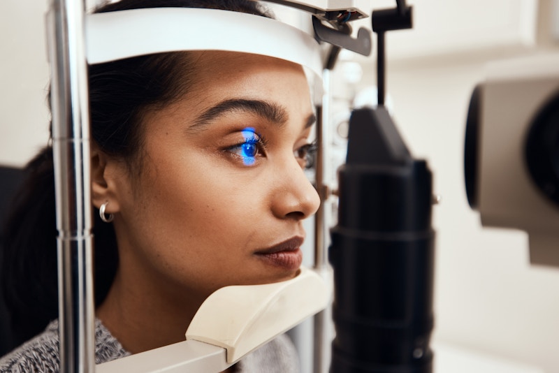Woman receiving eye exam