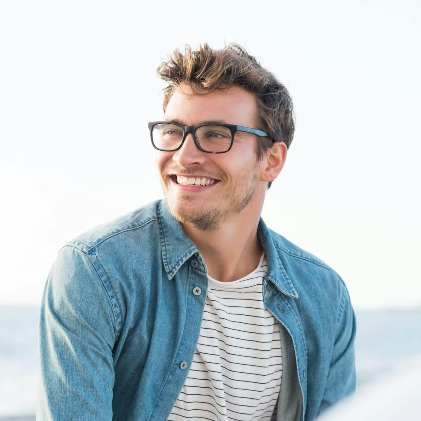 Man wearing glasses smiling