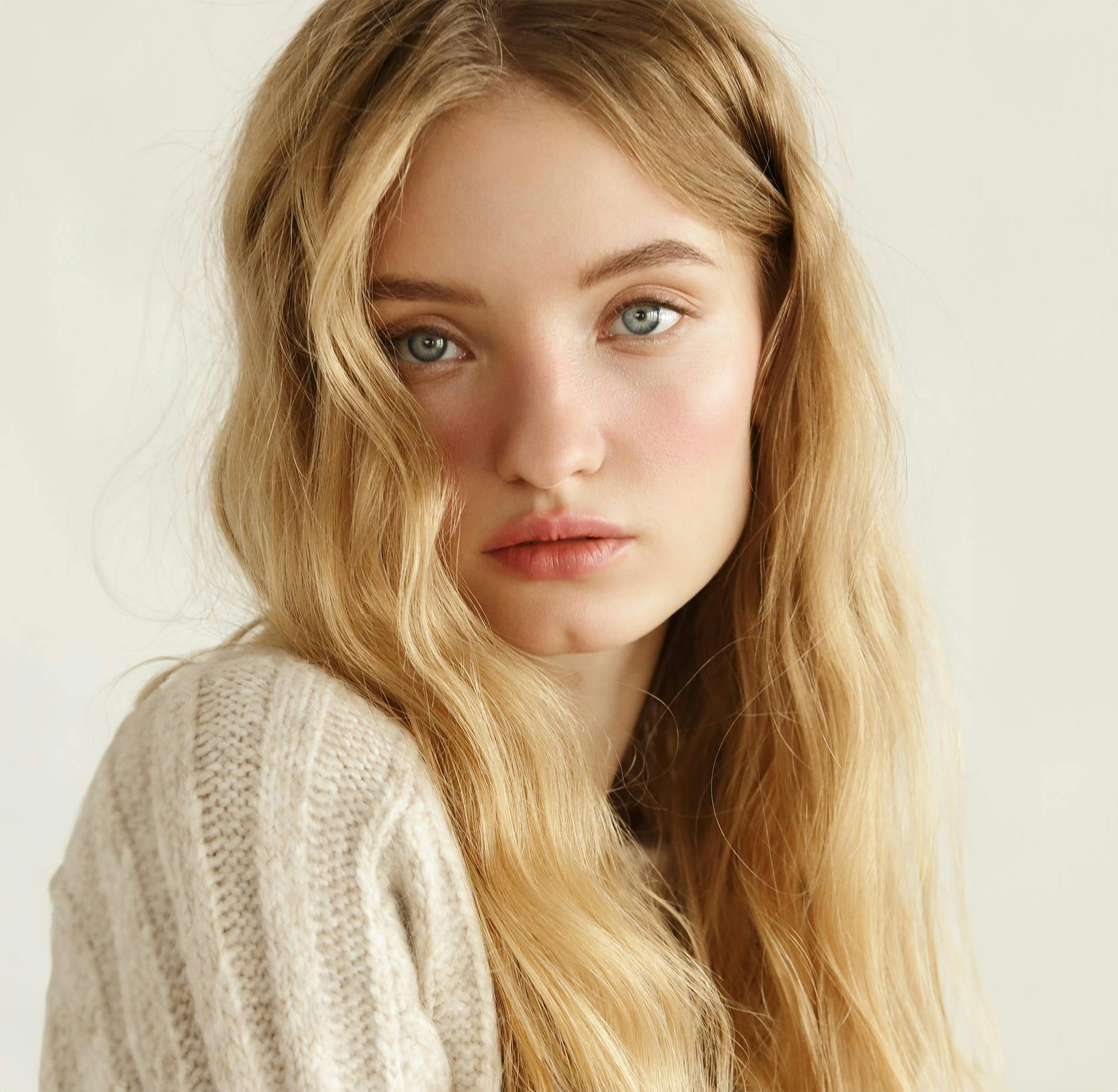 blonde woman in sweater