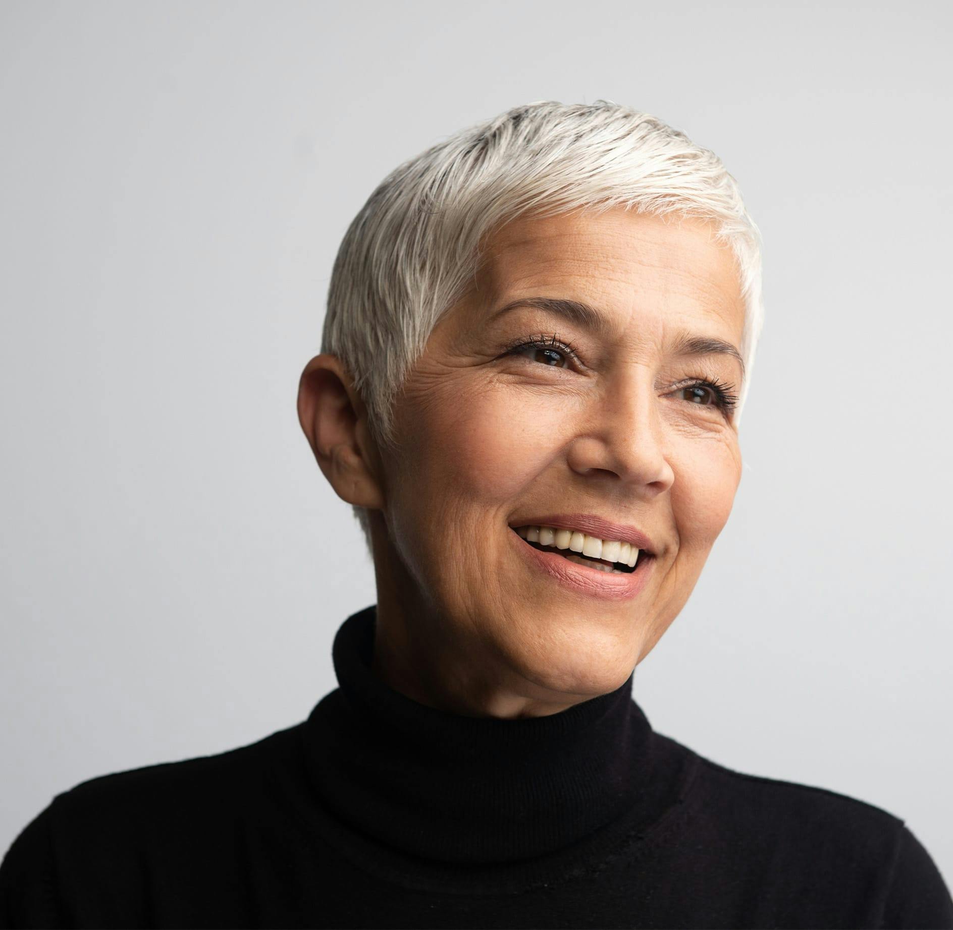Short-haired woman smiling