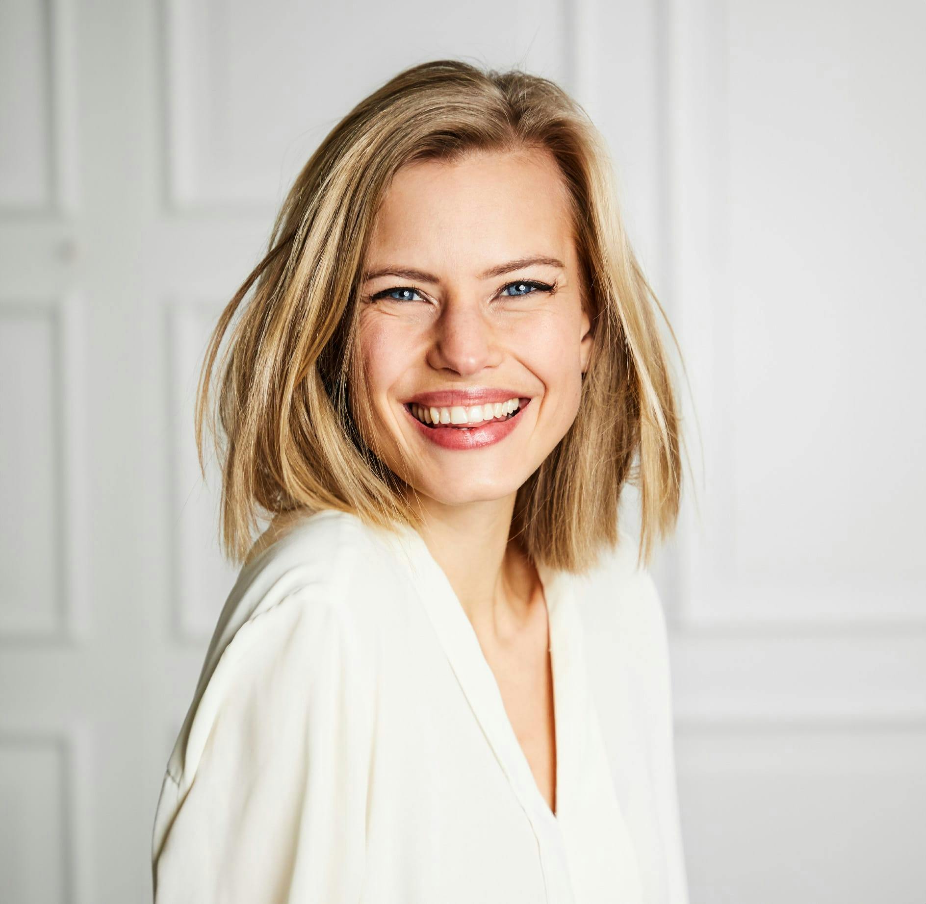 Blonde woman smiling