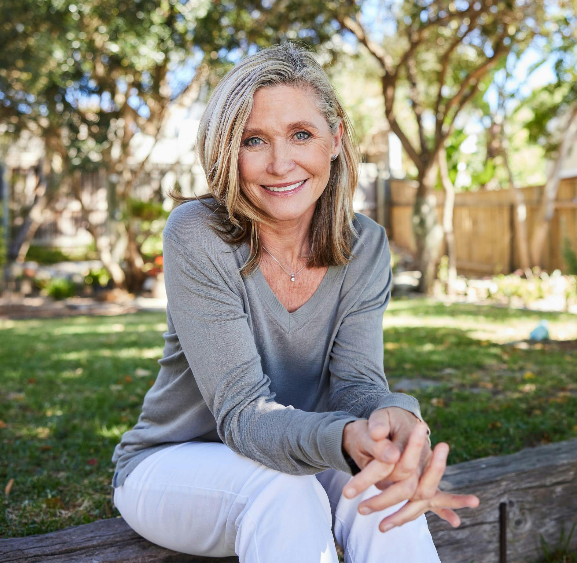 Woman in grey blouse