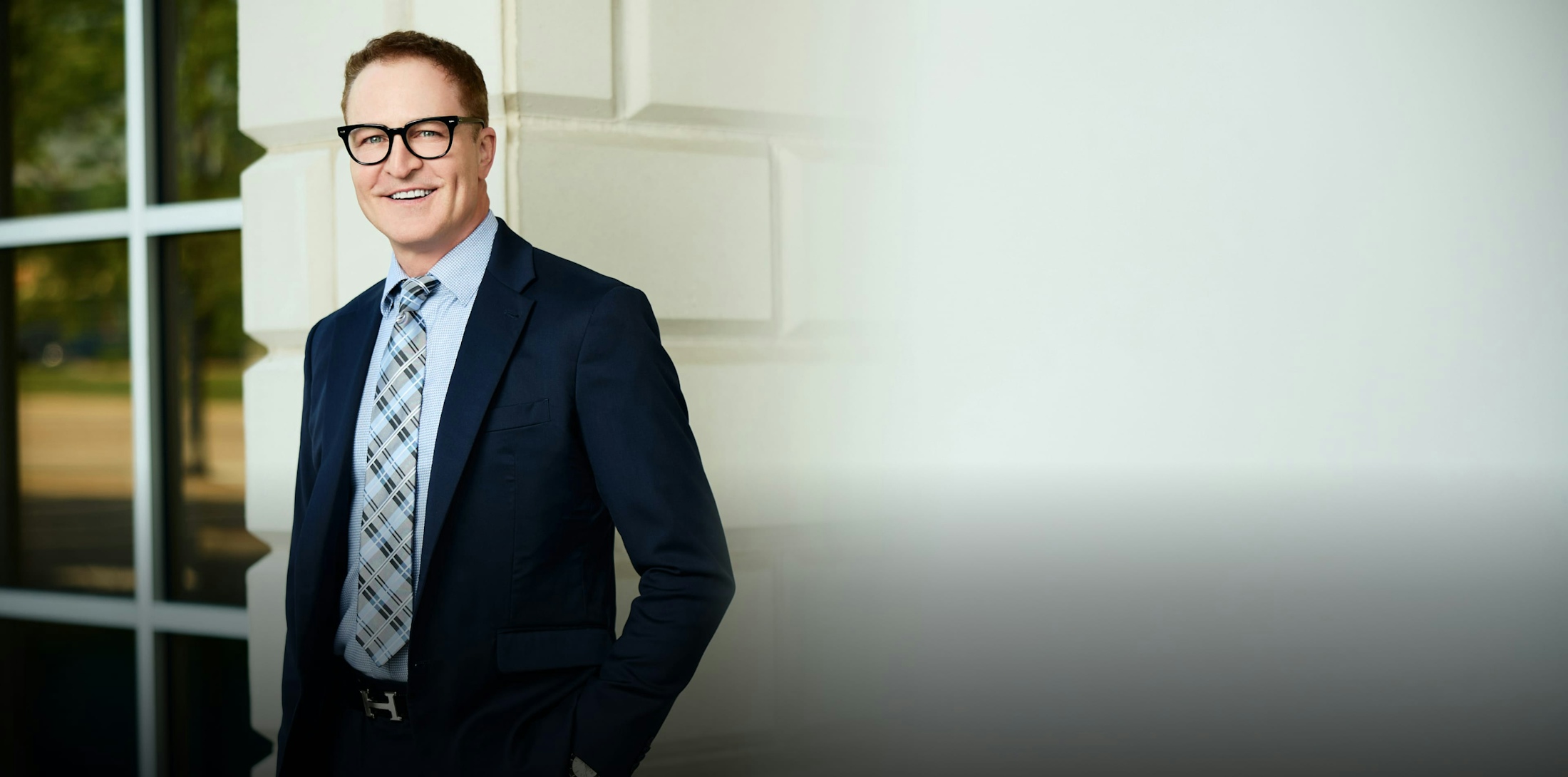 Dr. Mark Boschert in a suit