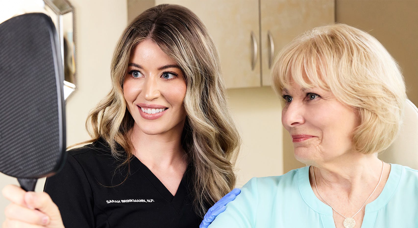 Woman smiling at doctor