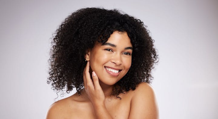 Nurse administering facial injection