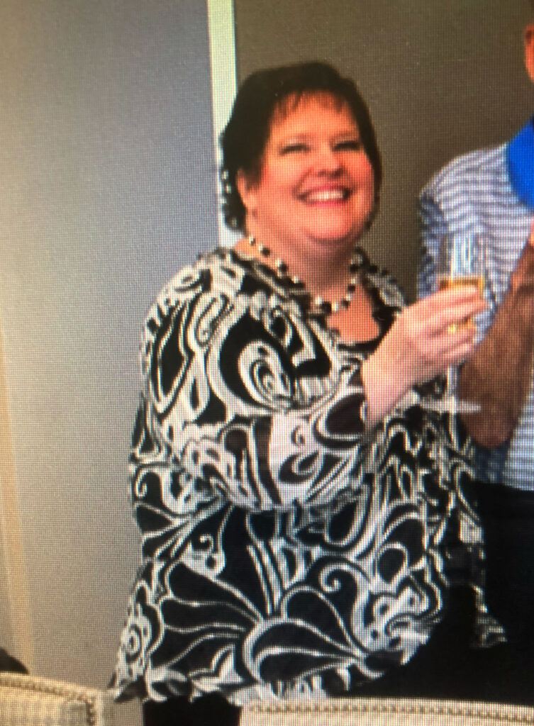 woman wearing a black and white top