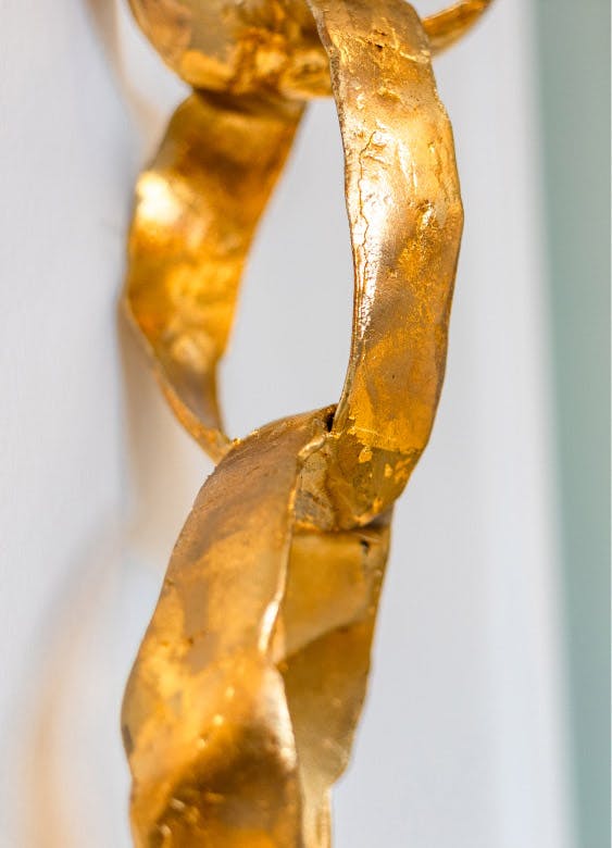 close up of gold metal chains