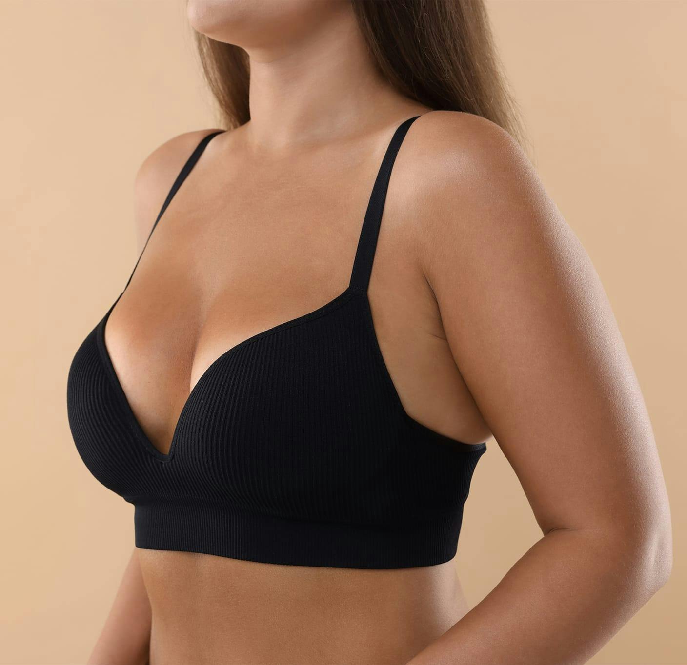 woman in a black bra
