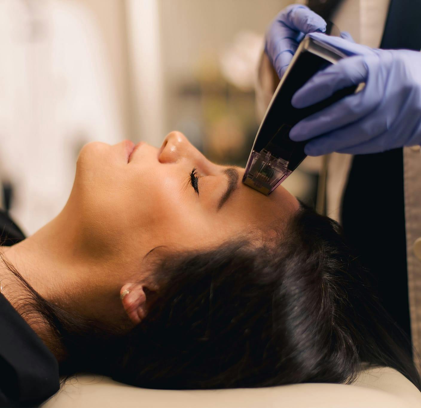 side profile of woman getting facial procedure done