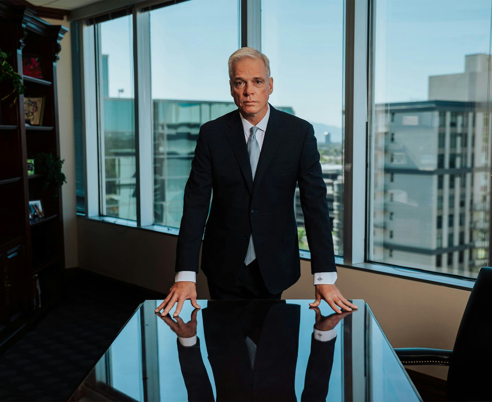 male attorney standing in office
