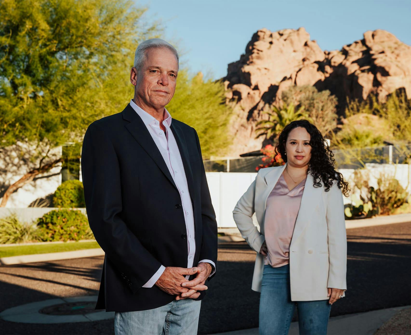 partner attorneys standing together outside