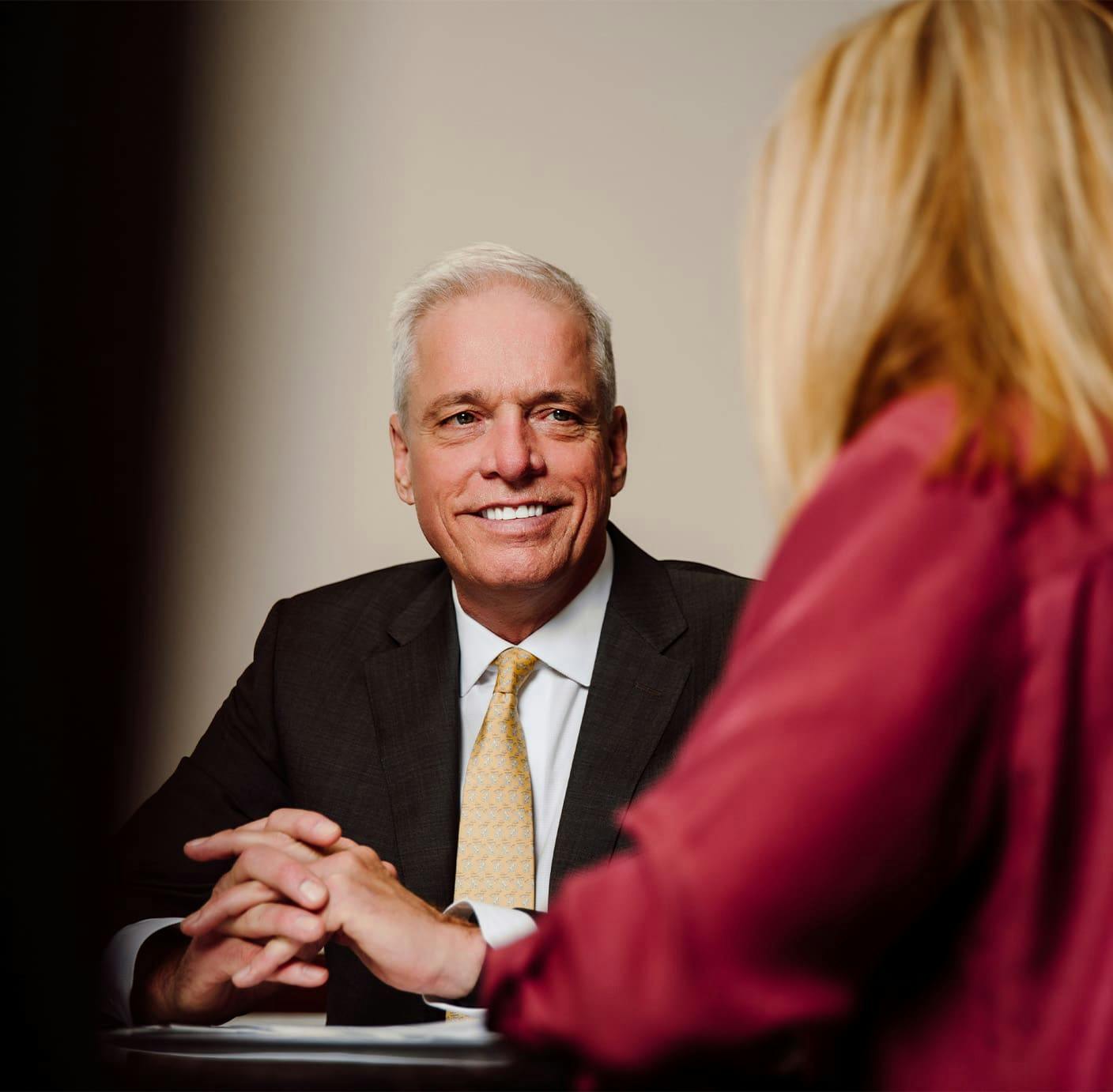 attorney sitting with client