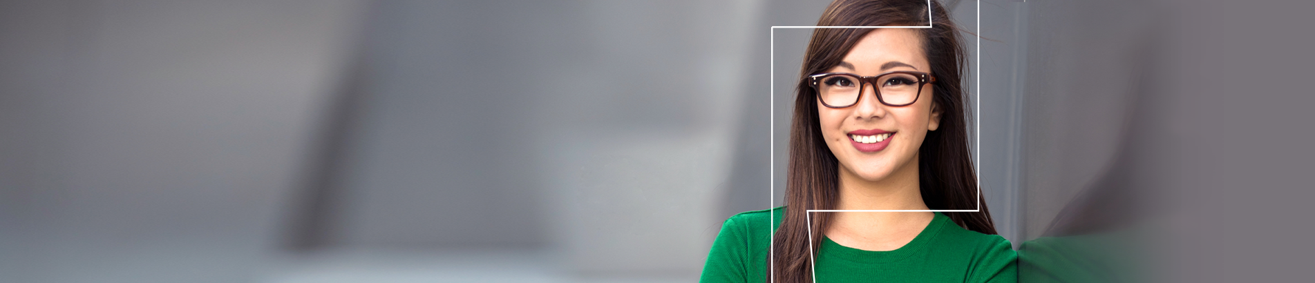 Woman with glasses smiling