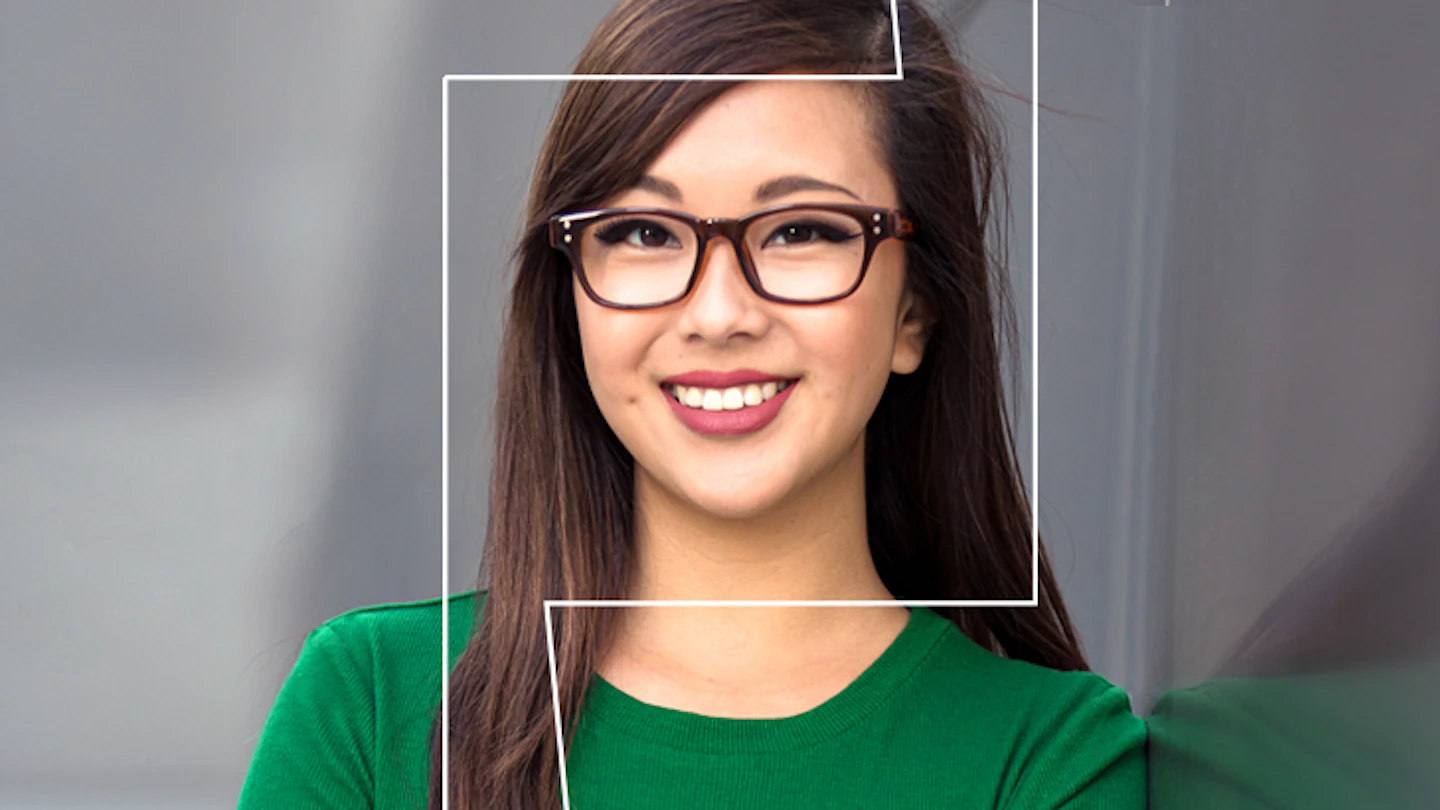 Woman with glasses smiling