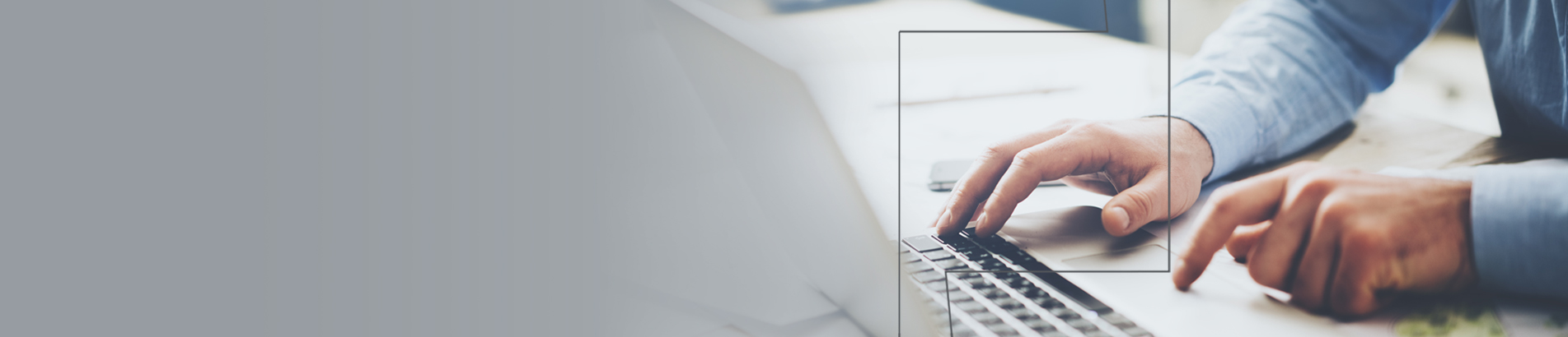 Pair of hands using laptop