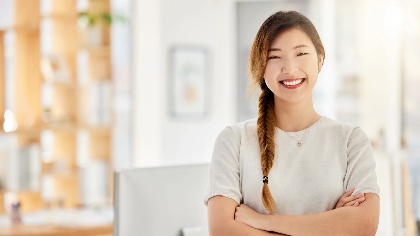 PSK SG Why Us Woman smiling office