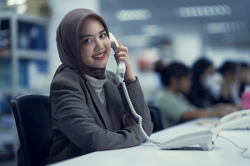 ID - woman on a phone at work