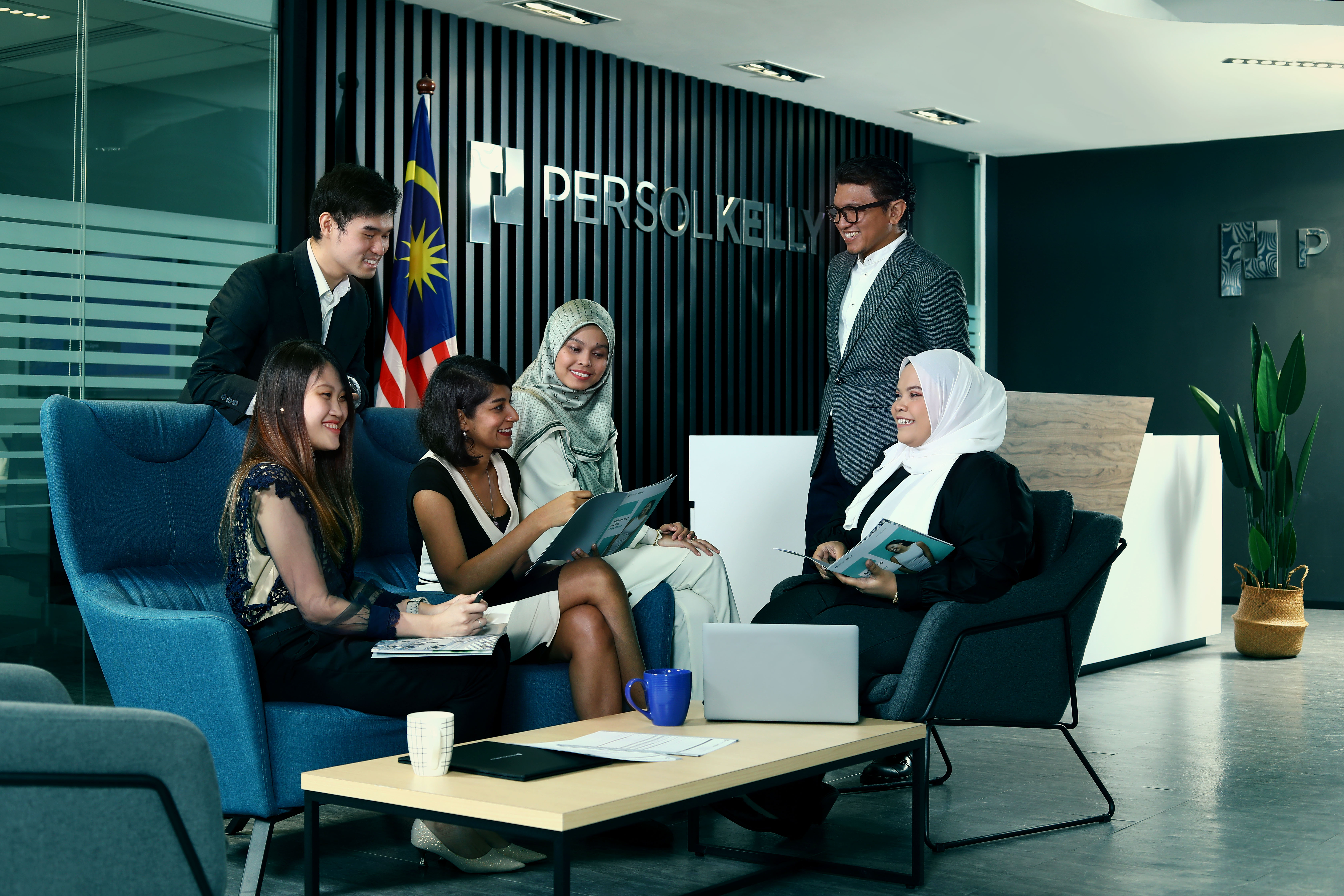 MY - group of people in an office foyer