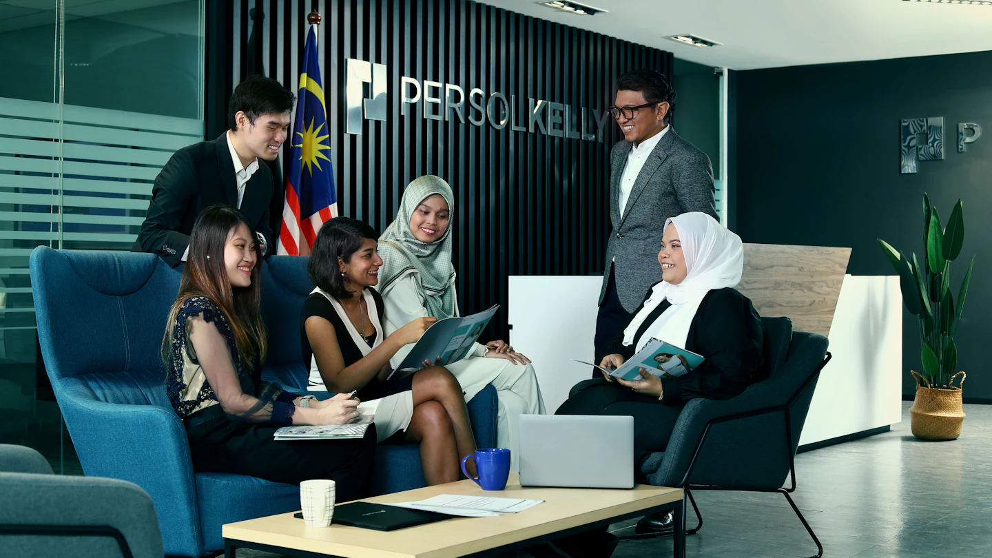 MY - group of people in an office foyer