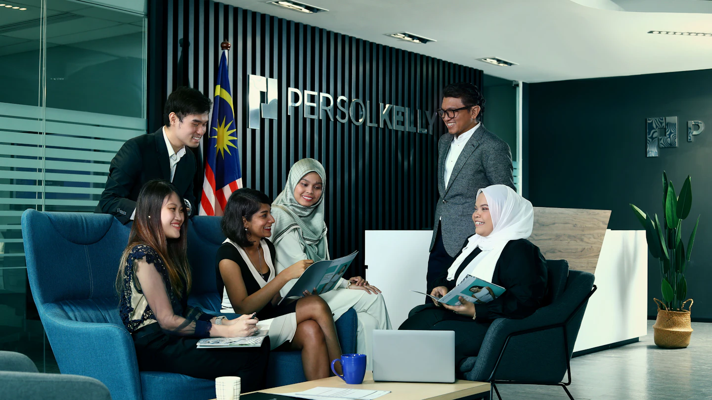 MY - group of people in an office foyer