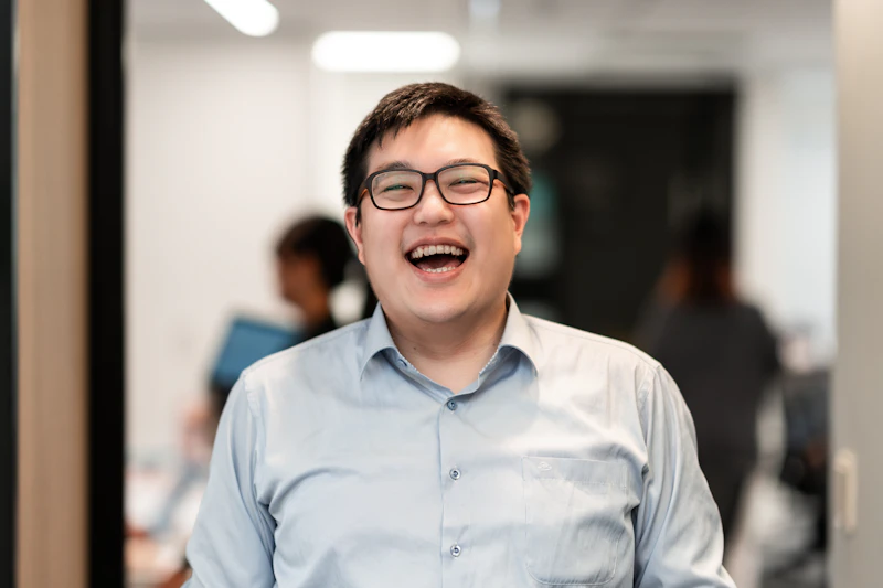 TW - Man smiling at camera