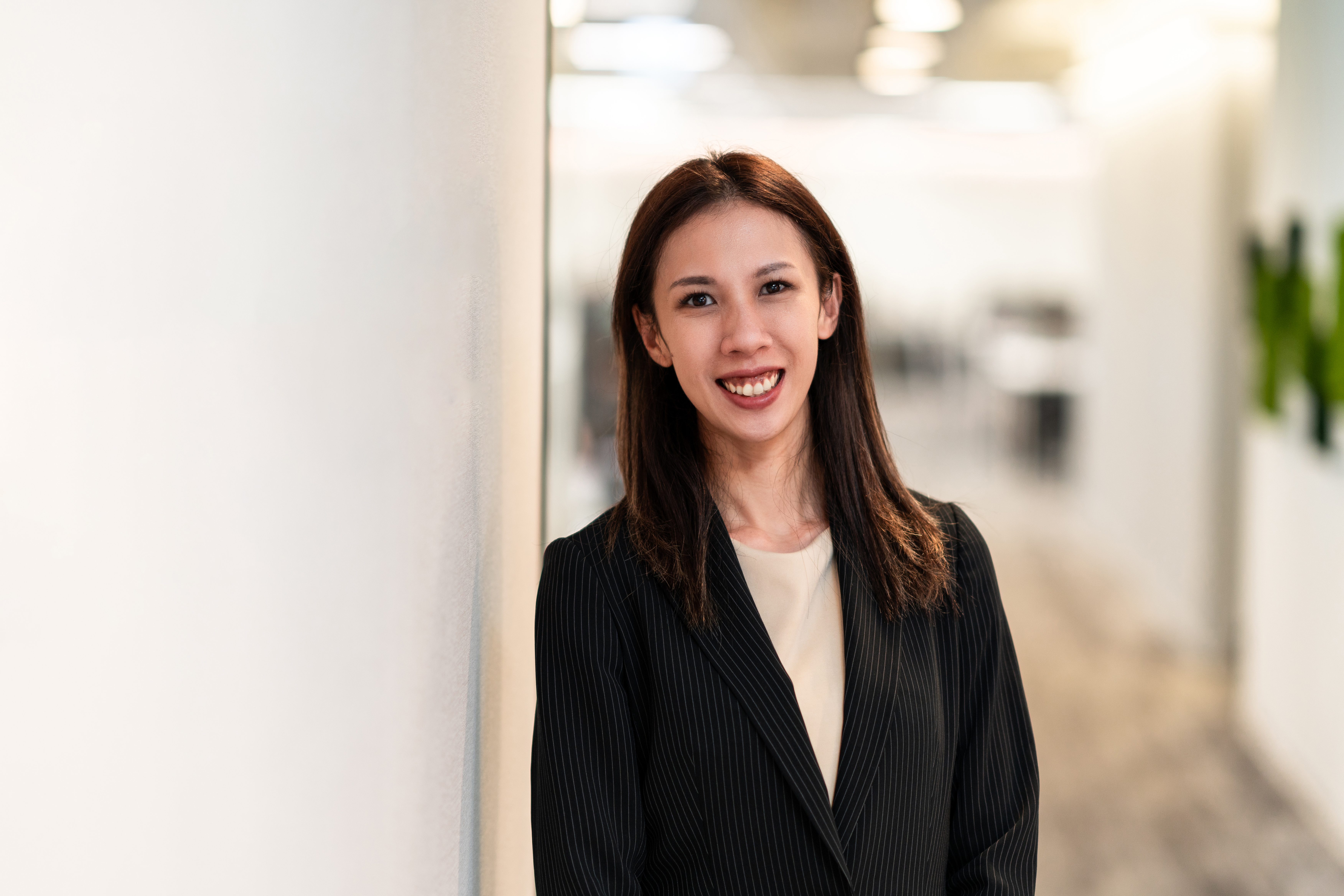 TW - smiling woman in an office