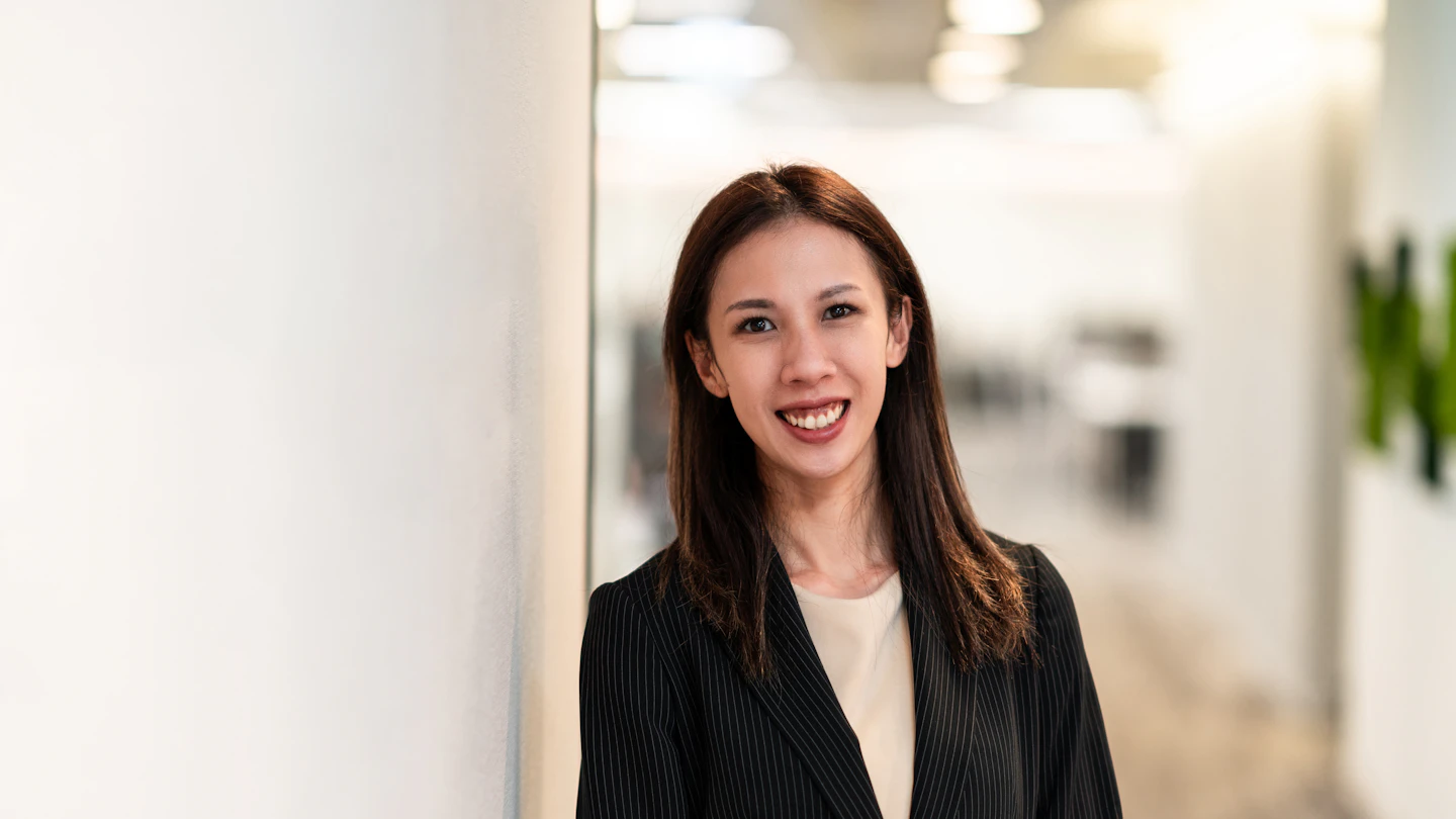 TW - smiling woman in an office
