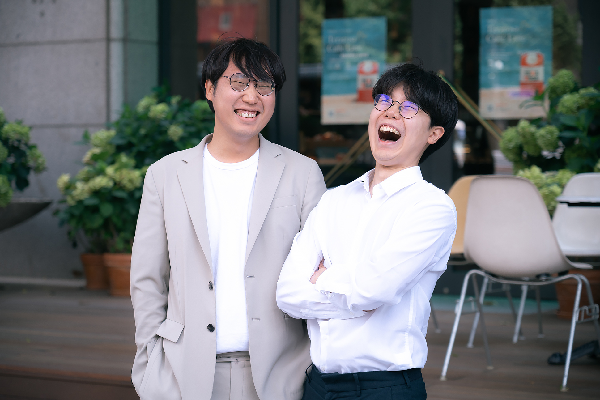 KR - two smiling men in business attire