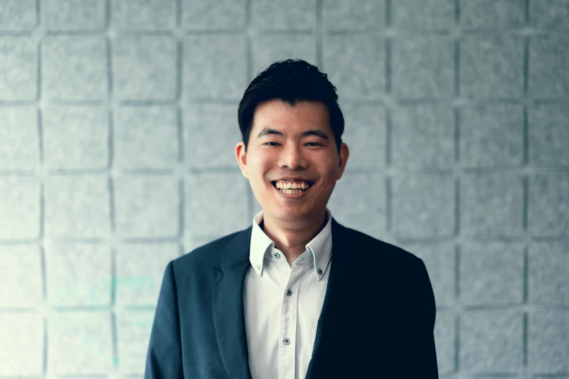 Smiling man wearing a suit