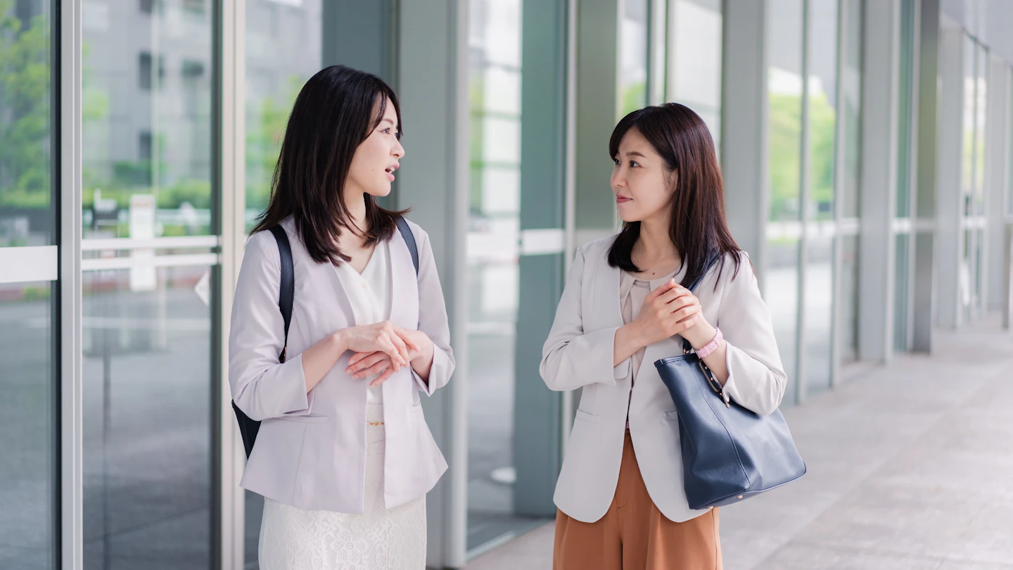 KR What we do Woman outside office