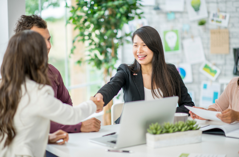 shaking hands in office