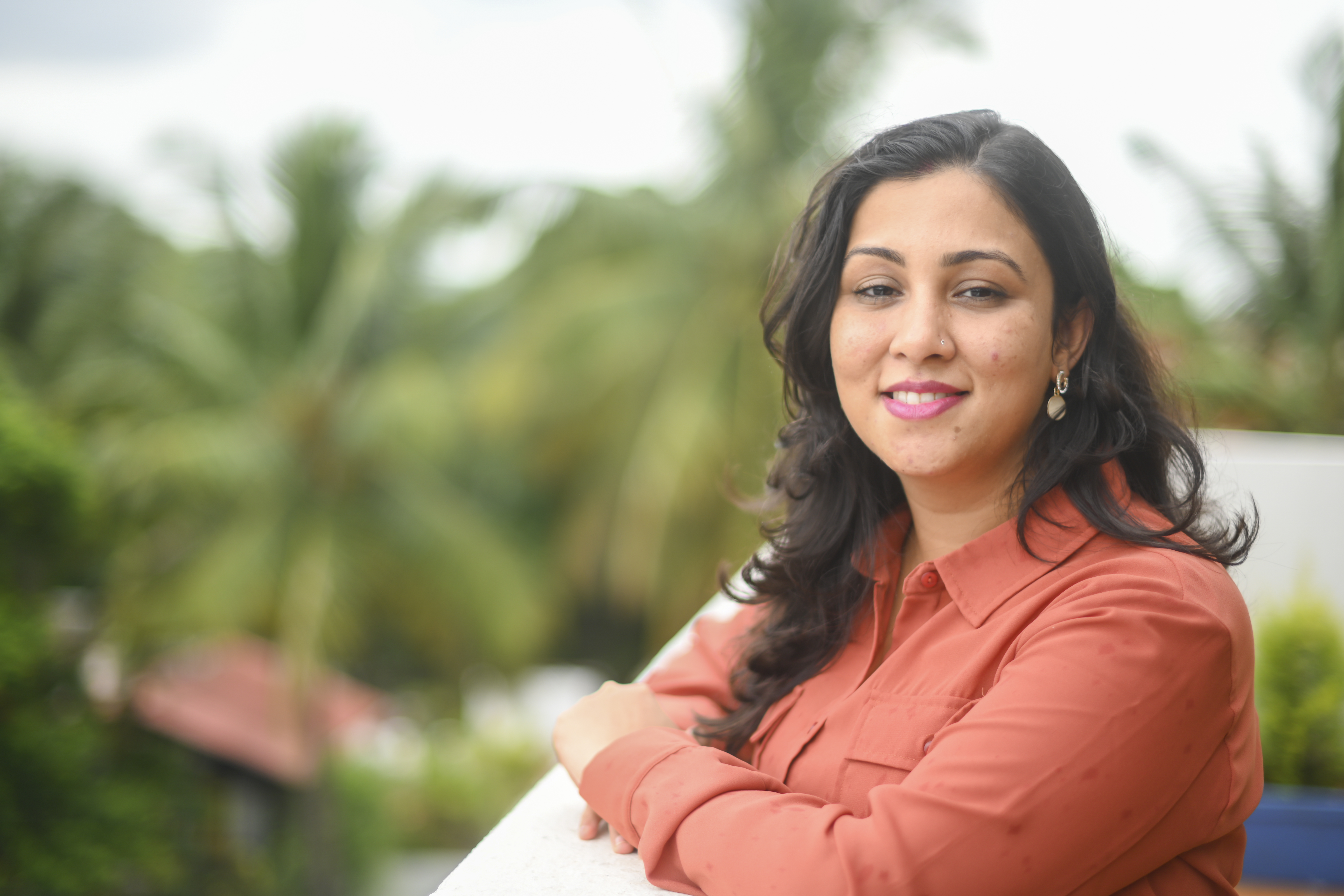 indian woman with crossed hands