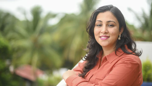 indian woman with crossed hands
