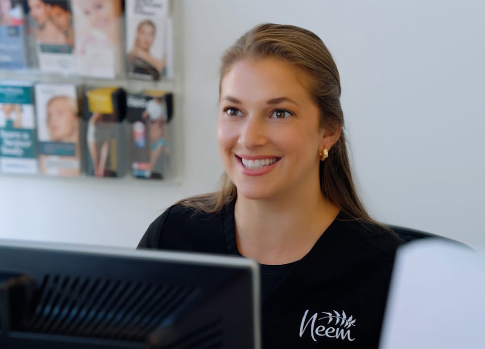 Receptionist smiling