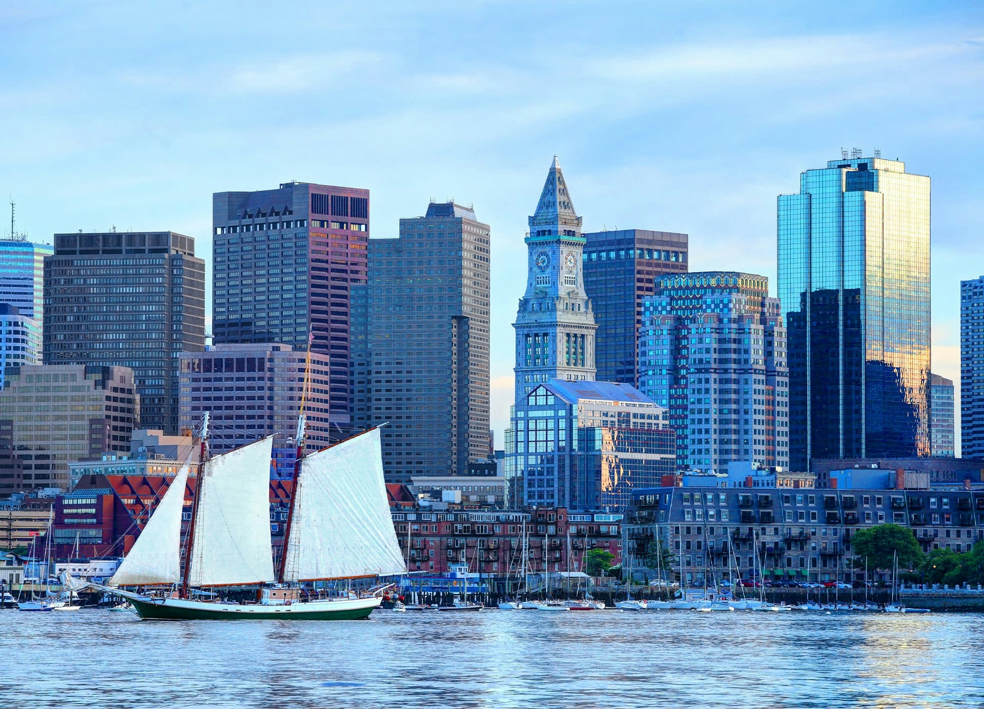Ships along harbor skyline