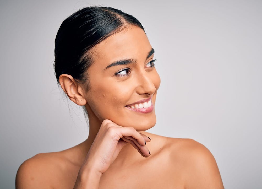 woman smiling over shoulder