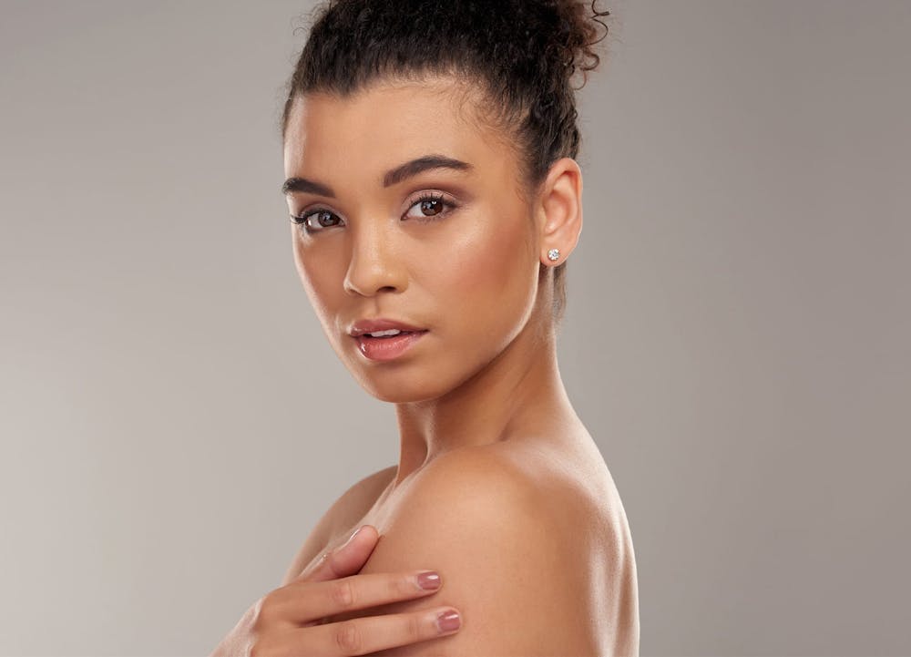 woman touching shoulder