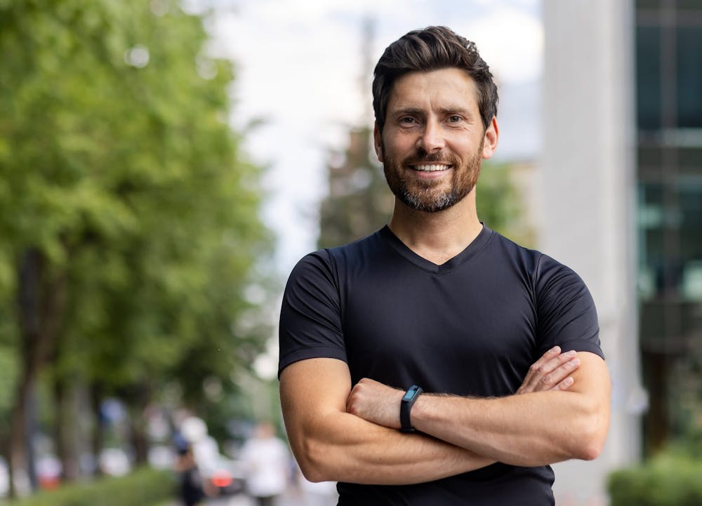 man in v-neck smiling