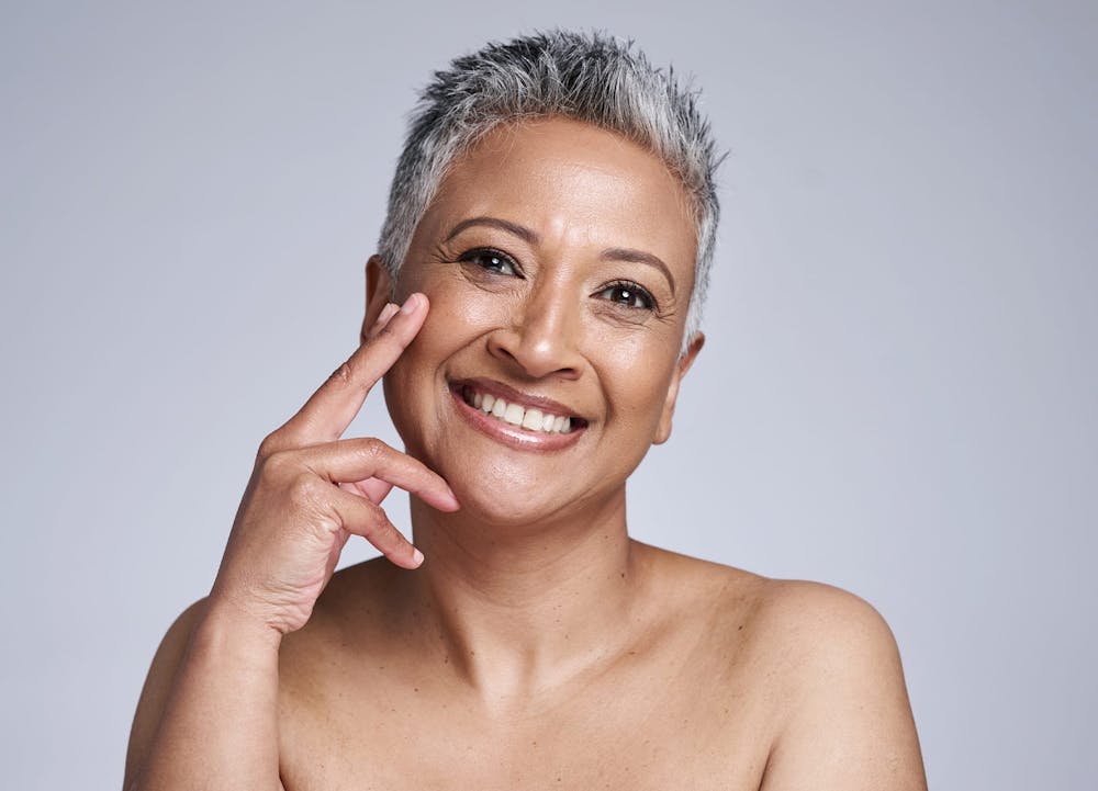 short-haired woman smiling