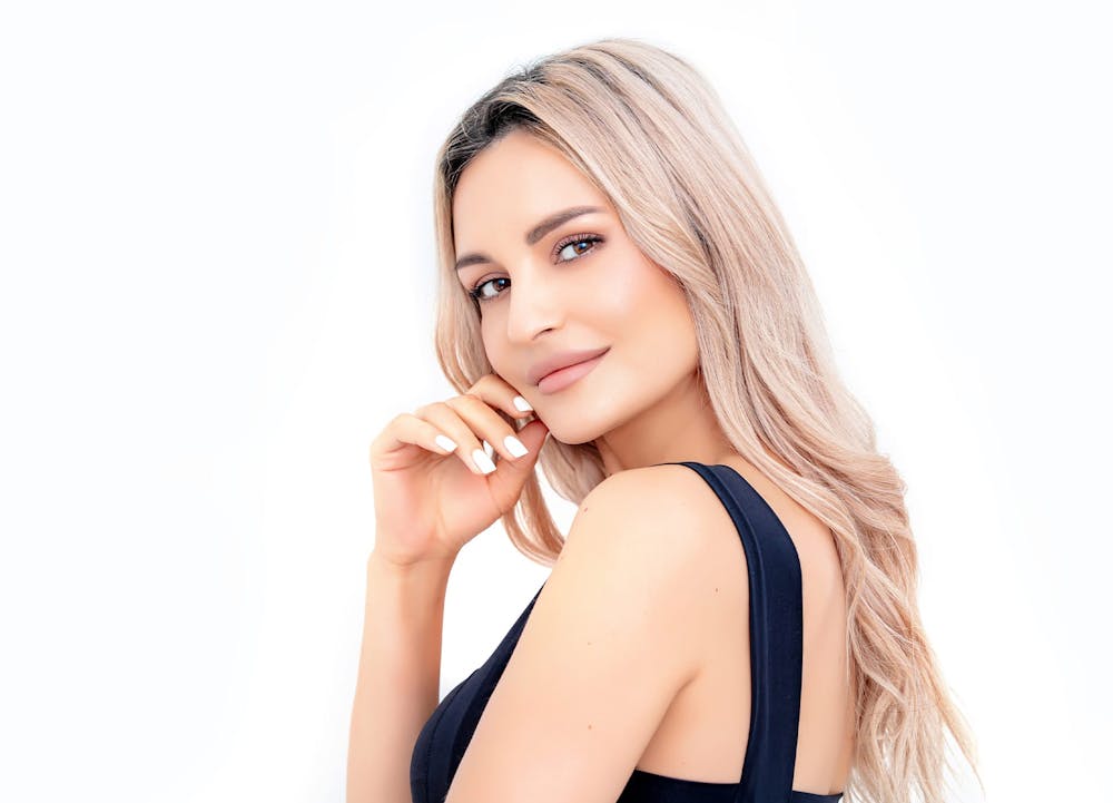 woman smiling over shoulder