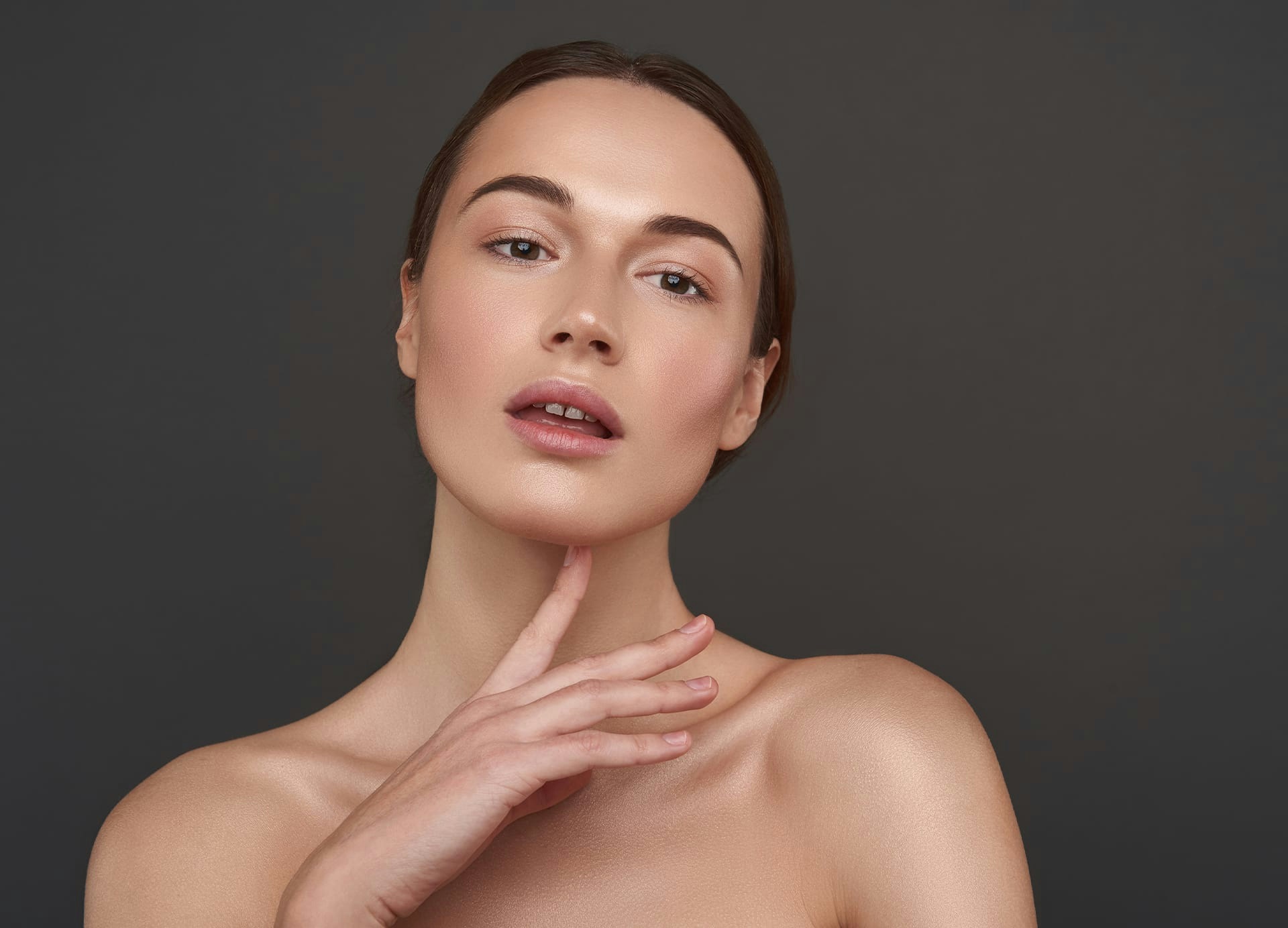 woman touching chin