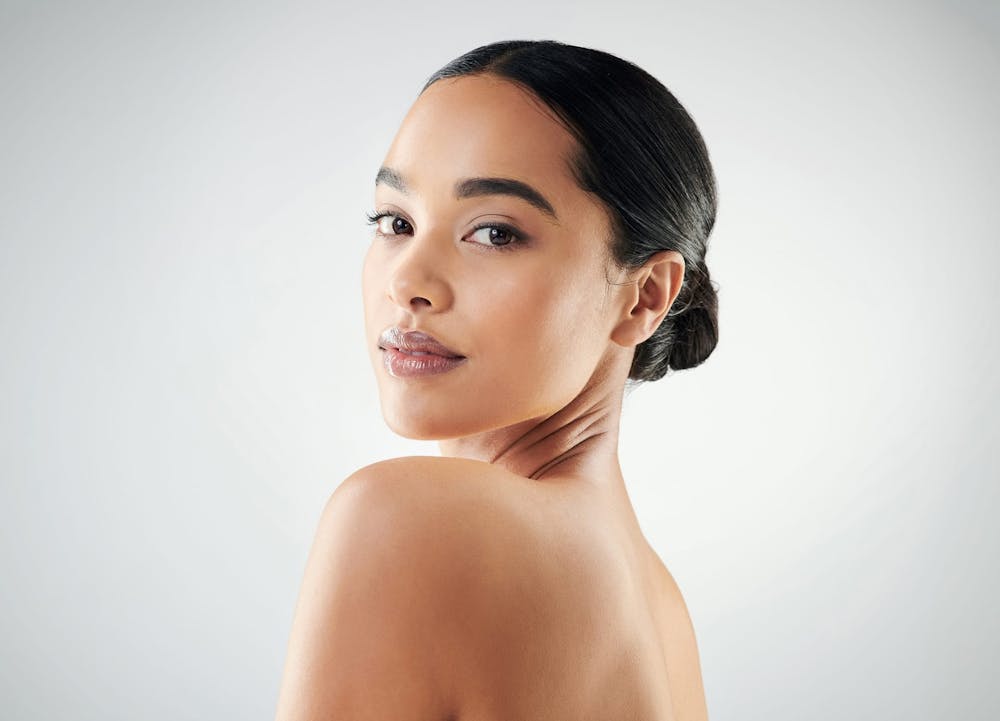 woman glancing over shoulder