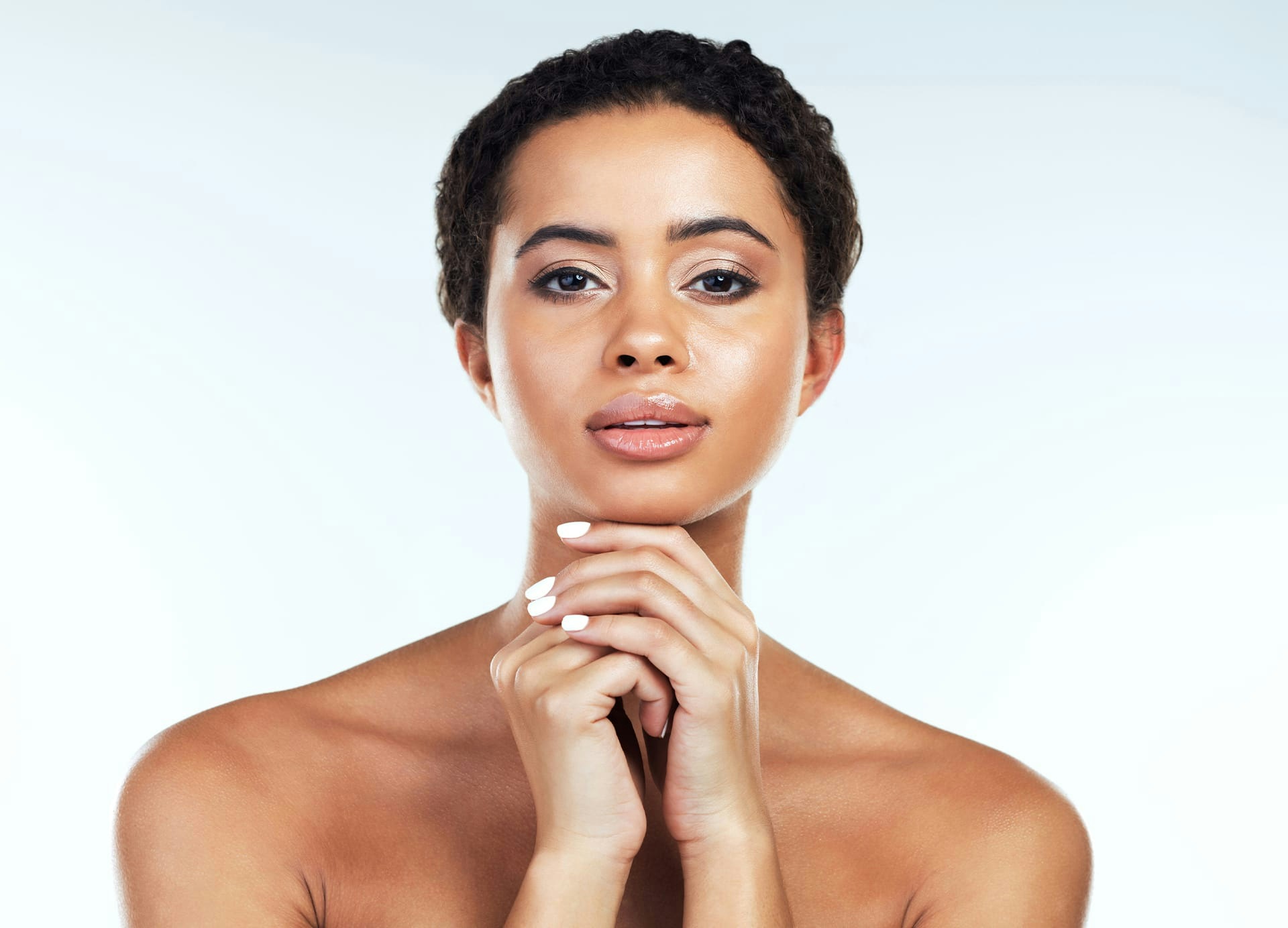 woman resting chin on hands
