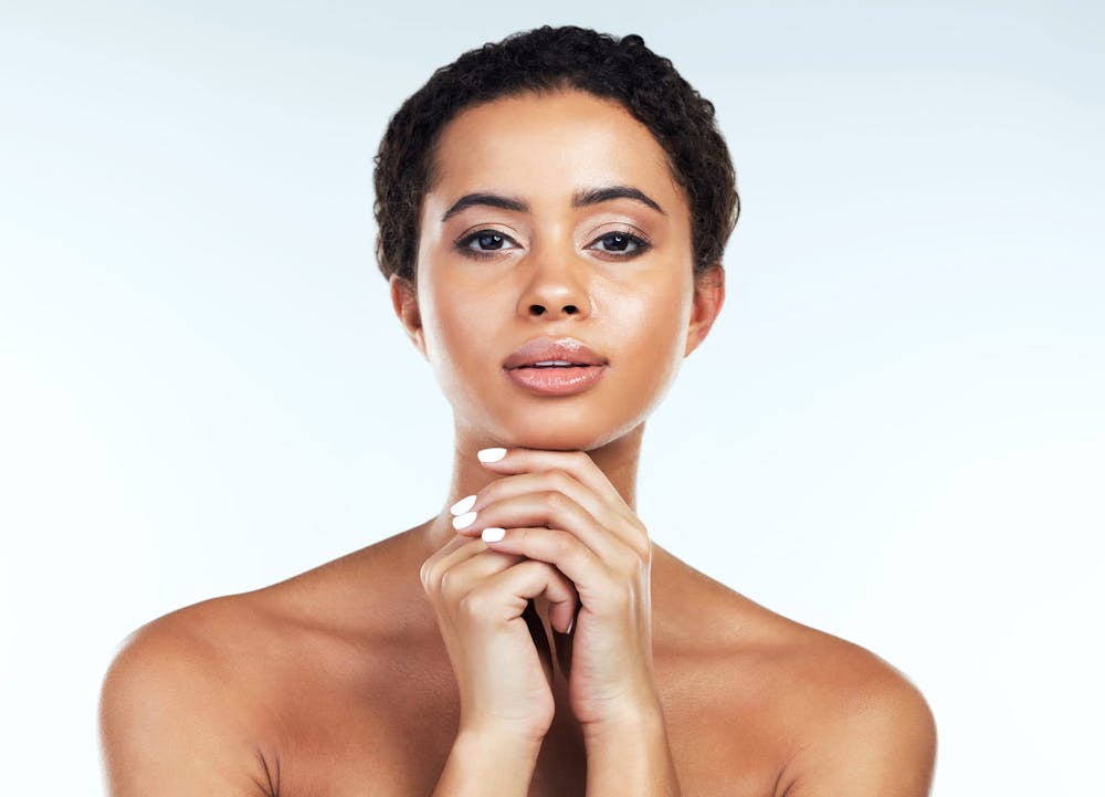 woman resting chin on hands