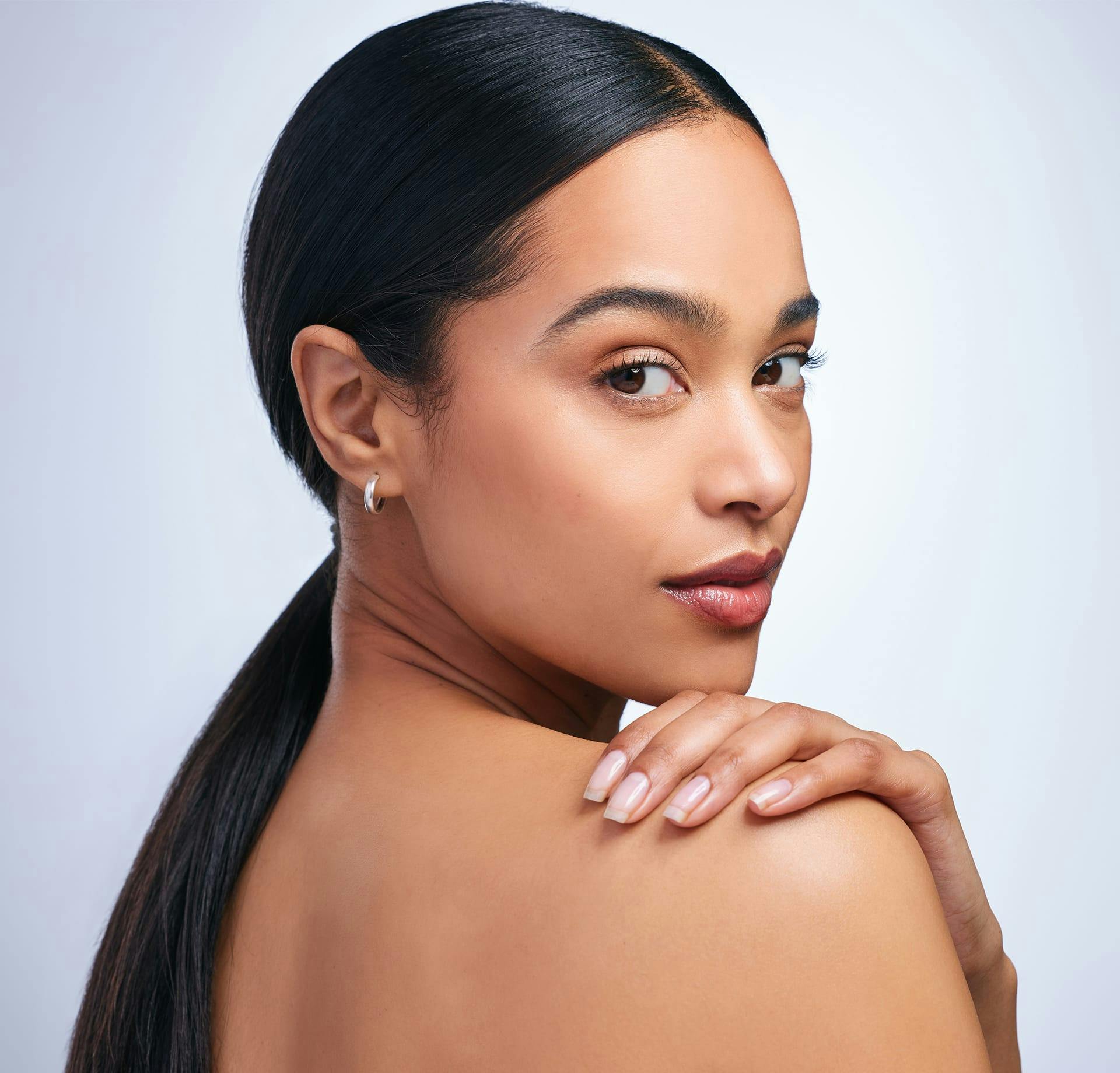 woman looking back over shoulder