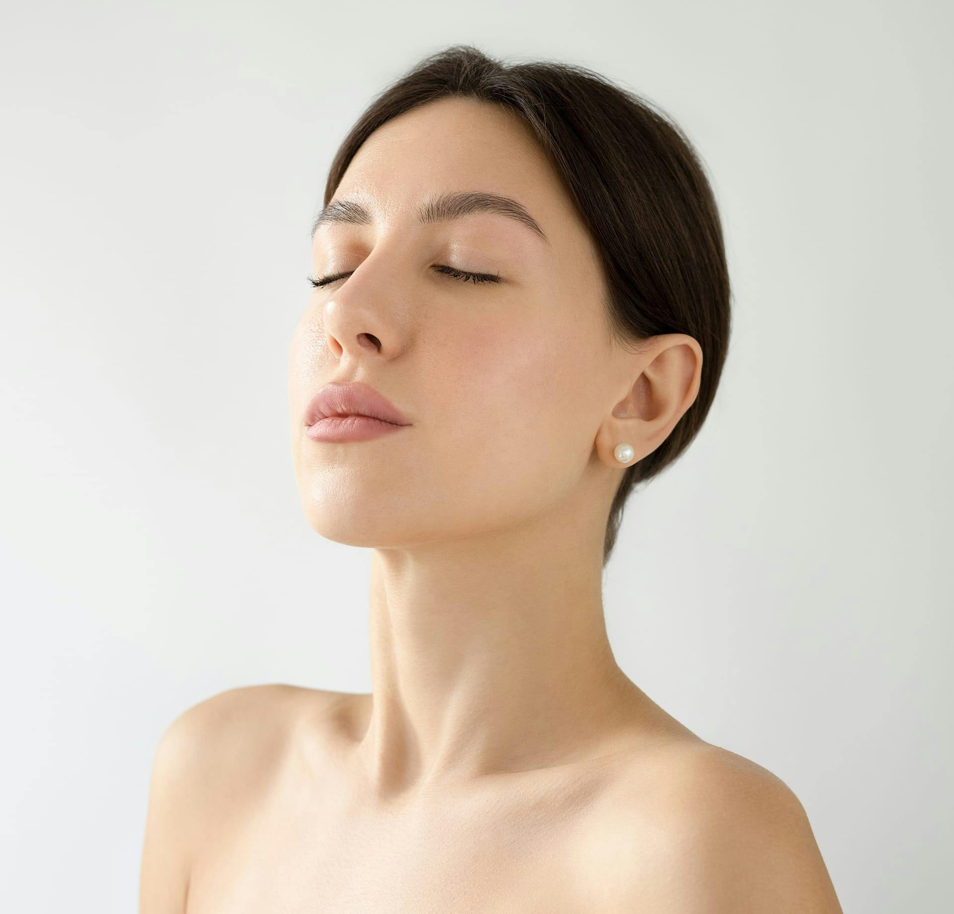 woman with eyes closed