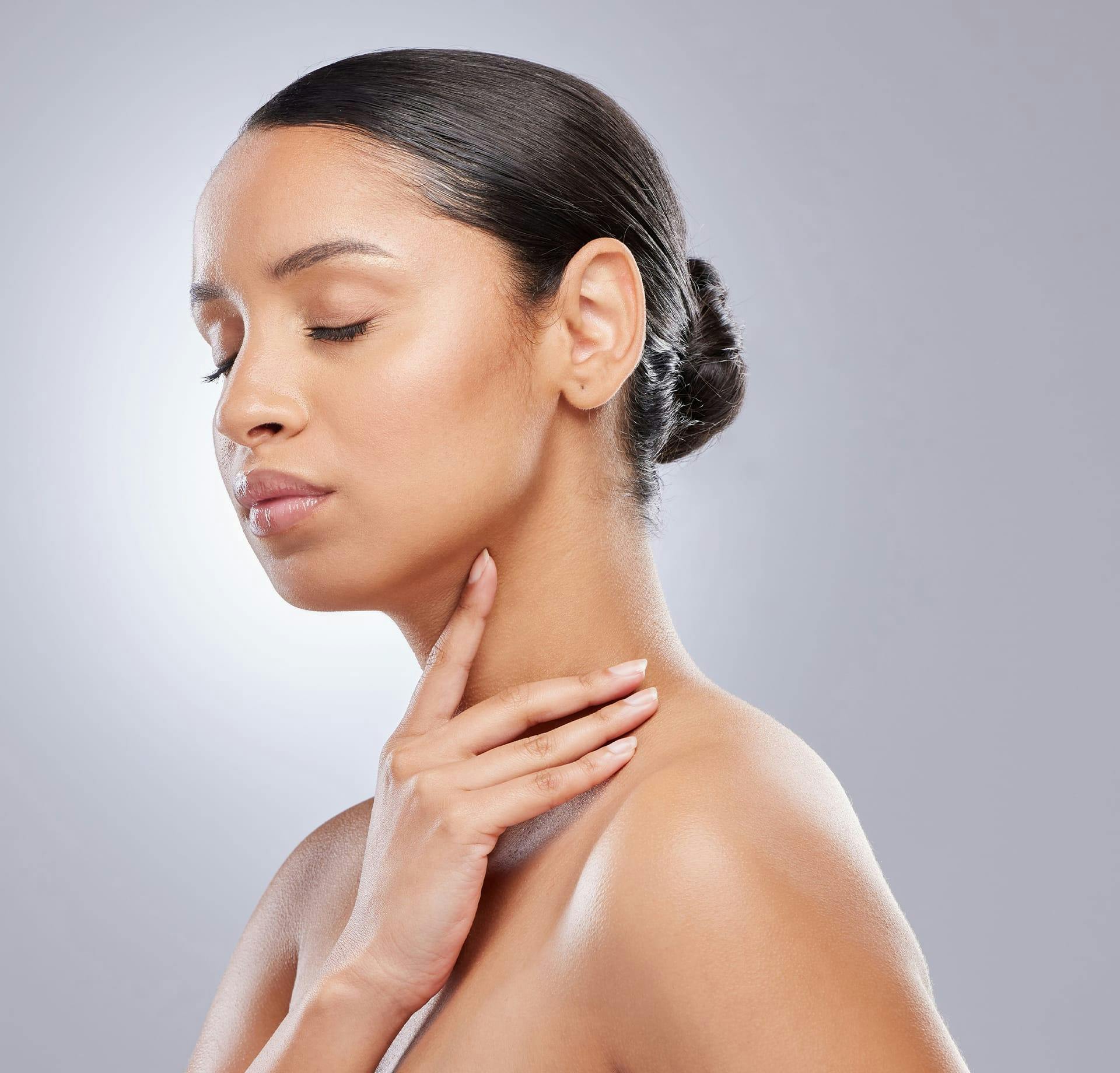 woman toucher her neck